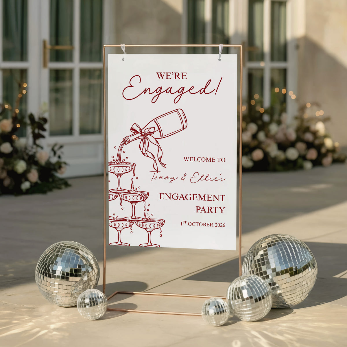 Personalised engagement party welcome sign with champagne tower design