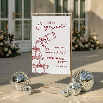 Personalised engagement party welcome sign with champagne tower design